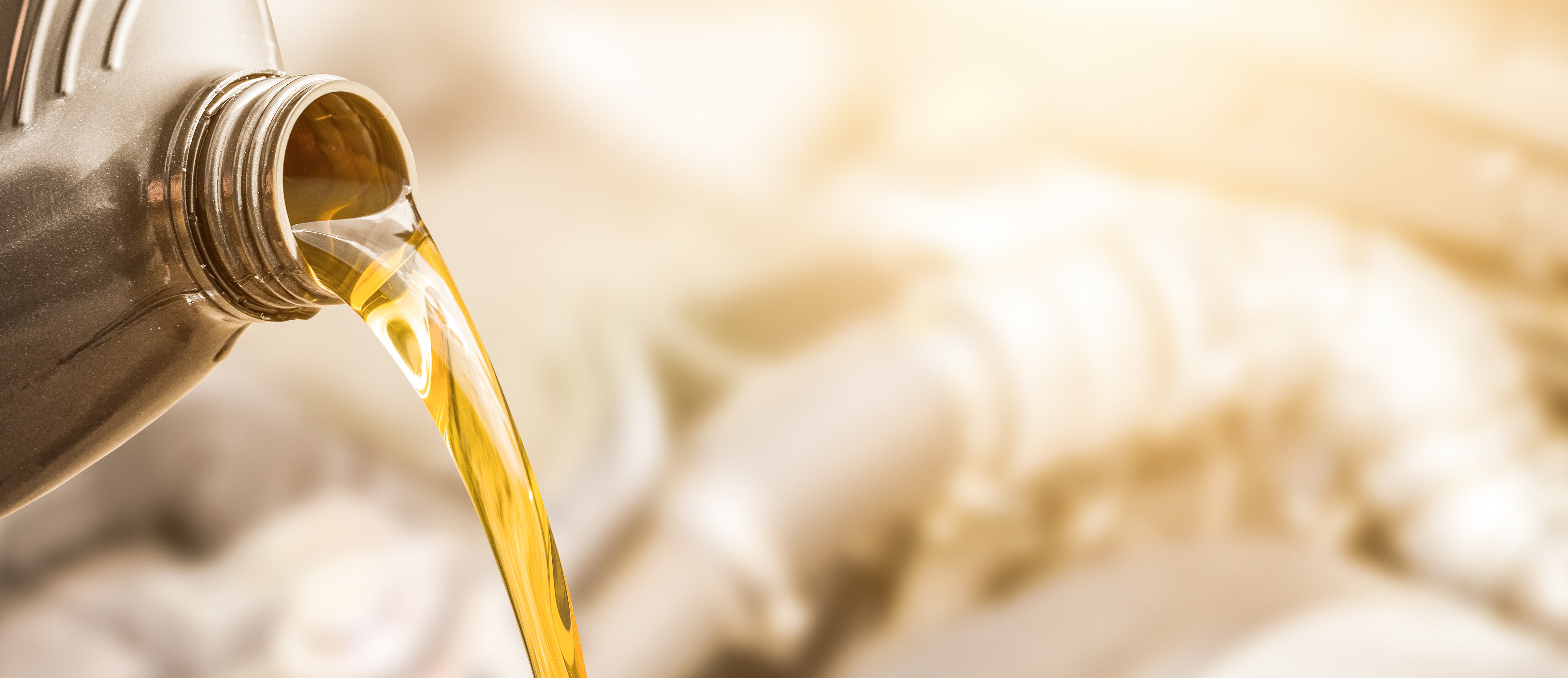 oil pouring out of a bottle